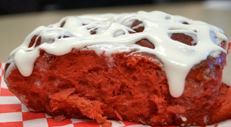 The Red Velvet Cinnamon Roll in all its gooey perfection