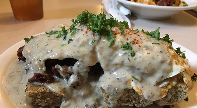 The Red Cup&#146;s gluten-free biscuit and gravy is topped with plant-based sausage and vegetable gravy. | Photo Jacob Threadgill