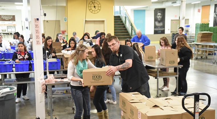 Volunteers work with donations in the Volunteer Center at Regional Food Bank of Oklahoma. (Gazette / file)