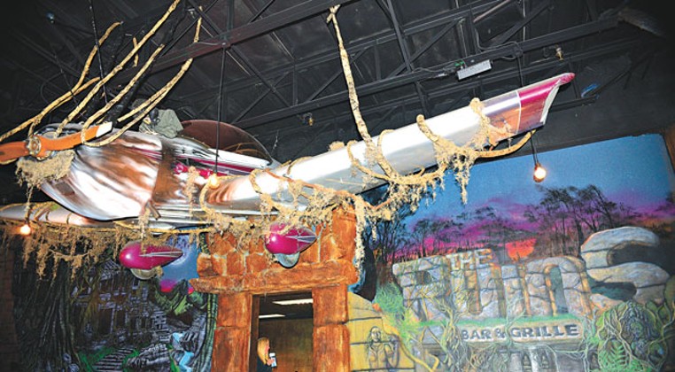 A giant plane hangs suspended in The Ruins Bar & Grille. (Photo Jacob Threadgill)