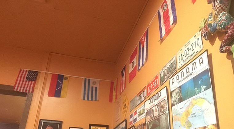 Flags from all of the countries represented on Zarate&#146;s menu. (Photo Jacob Threadgill)
