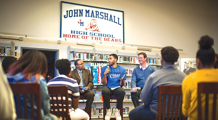 Oklahoma City Thunder&#146;s Josh Huestis discusses the classic novel Invisible Man at John Marshall Mid-High School in January as part of the Ralph Ellison Foundation&#146;s outreach efforts. | Photo provided