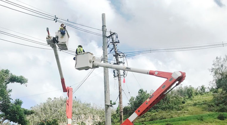 OG&E linemen work to restore power in Puerto Rico last month. (Photo provided)