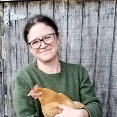 Sara Braden with one of her backyard hens.