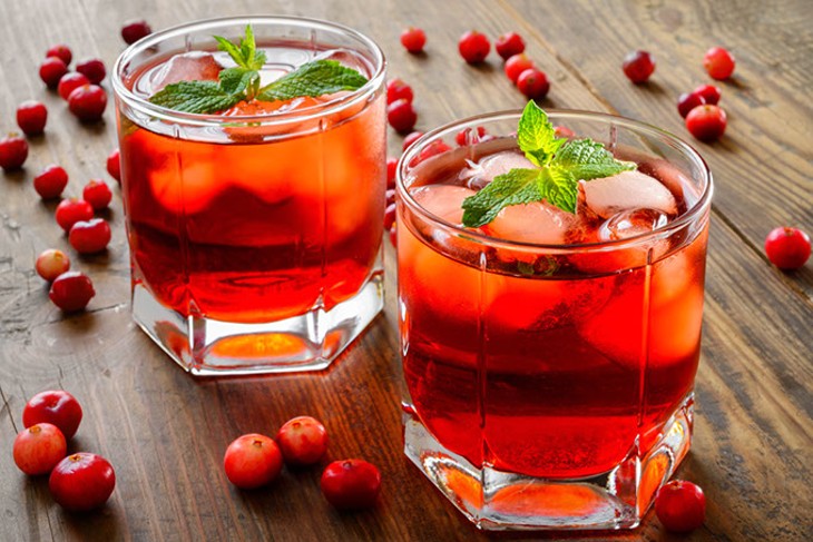 Use all those cranberries to liven spirits in this cranberry mojito.