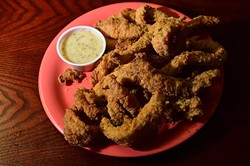 Fried catfish and dipping sauce. (Mark Hancock)