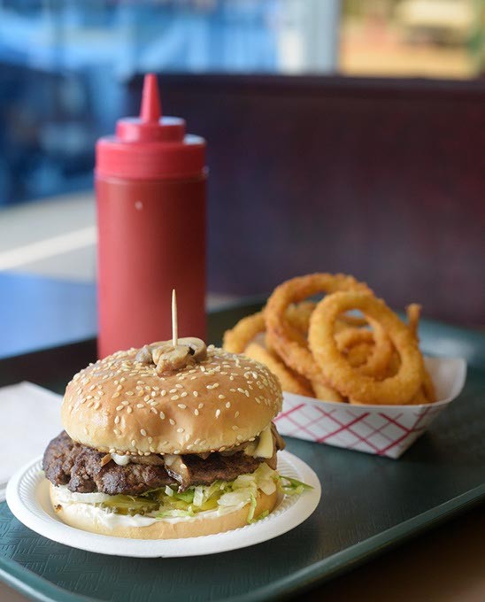 A mushroom burger and onion rings | Photo Garett Fisbeck